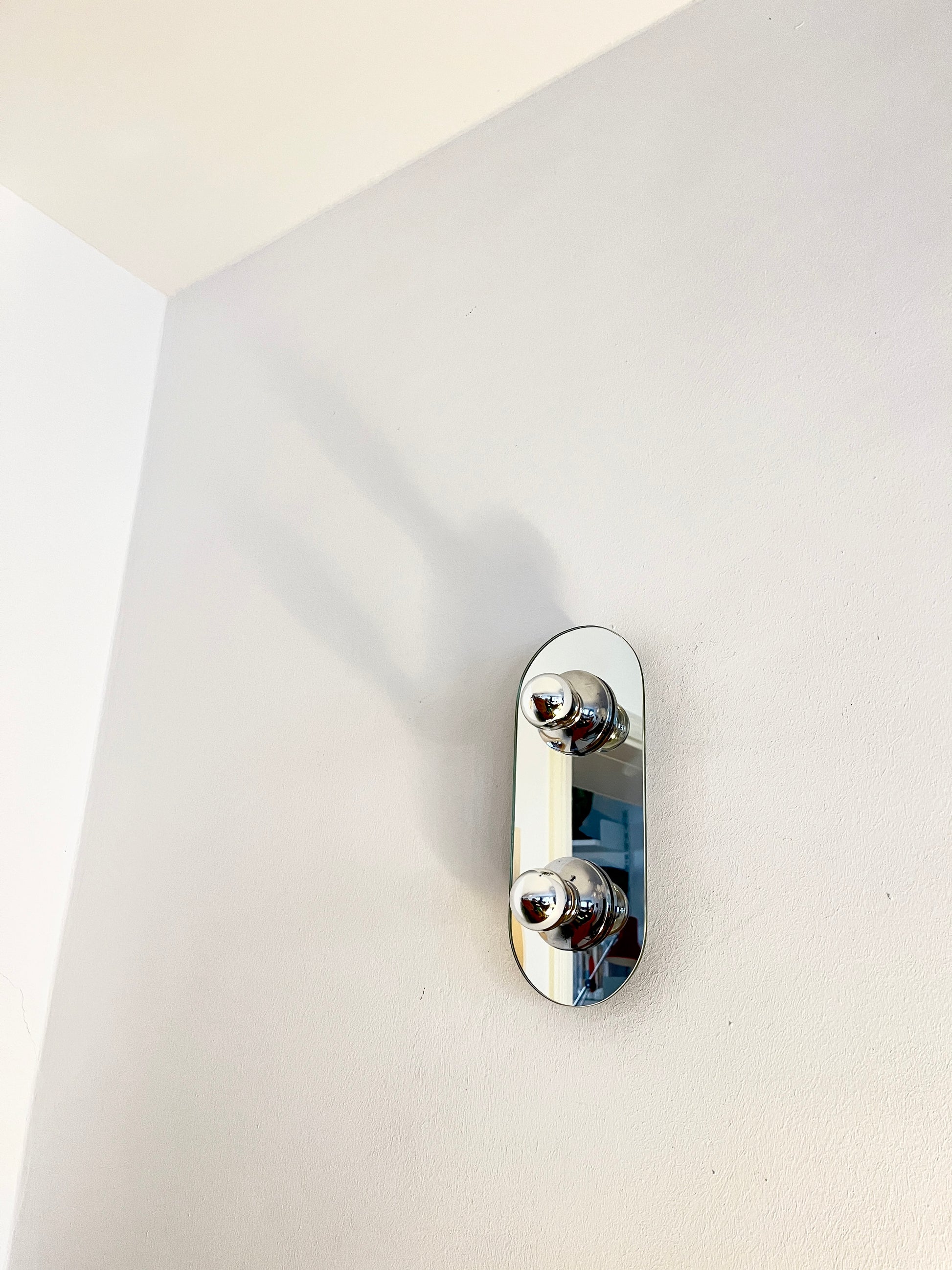 Vintage 1980s EGLO Germany wall lamp with mirrored glass front and silver metal frame, modernist two bulb sconce