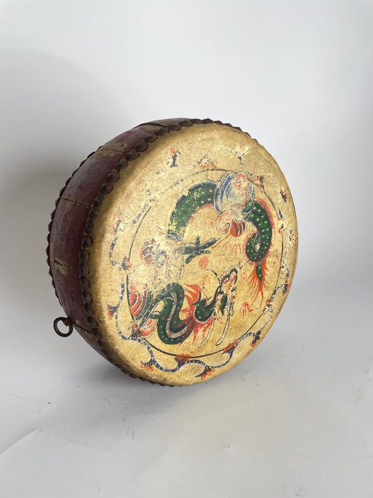 Antique handmade drum made of leather and wood, Asia