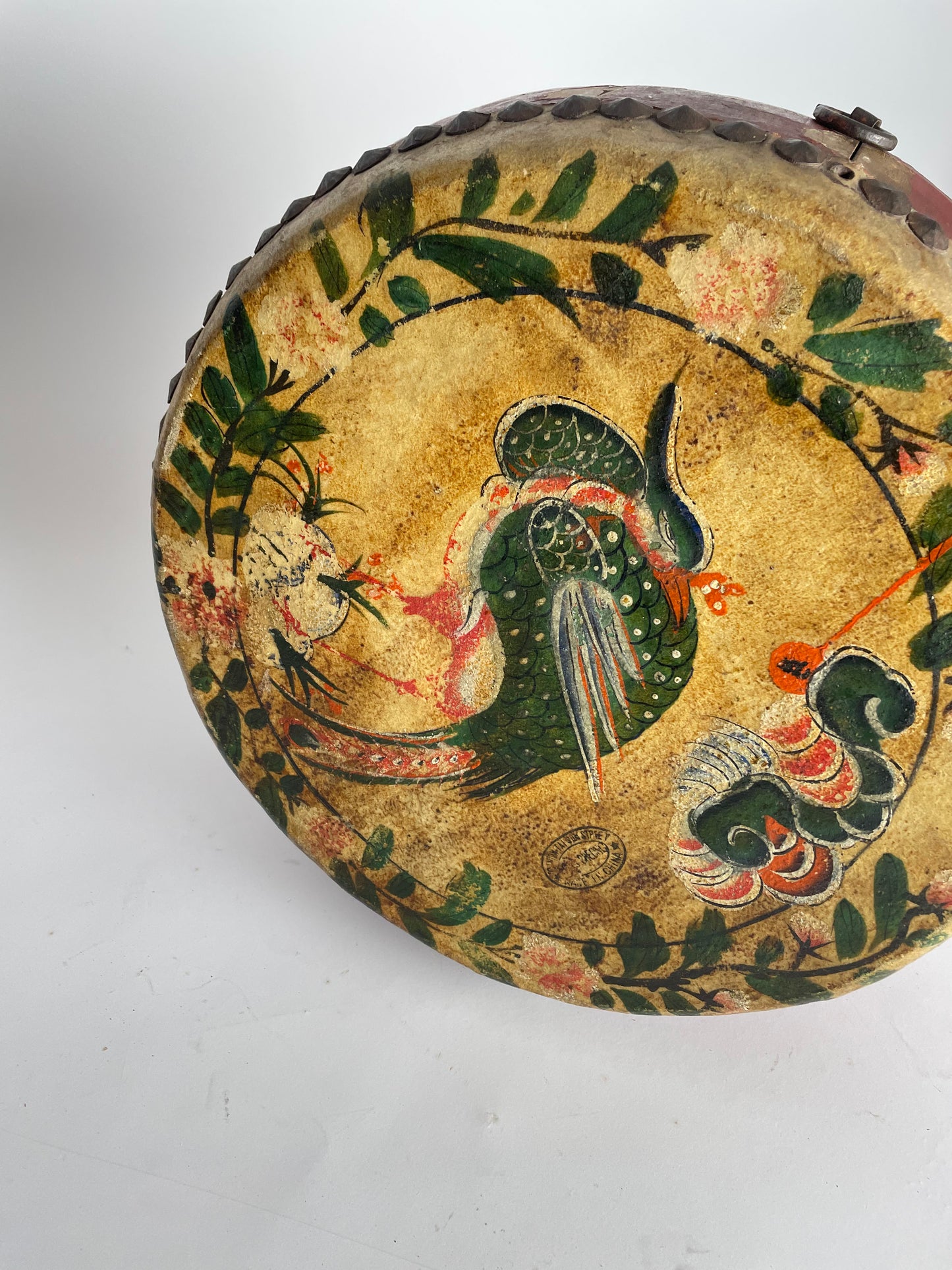 Antique handmade drum made of leather and wood, Asia