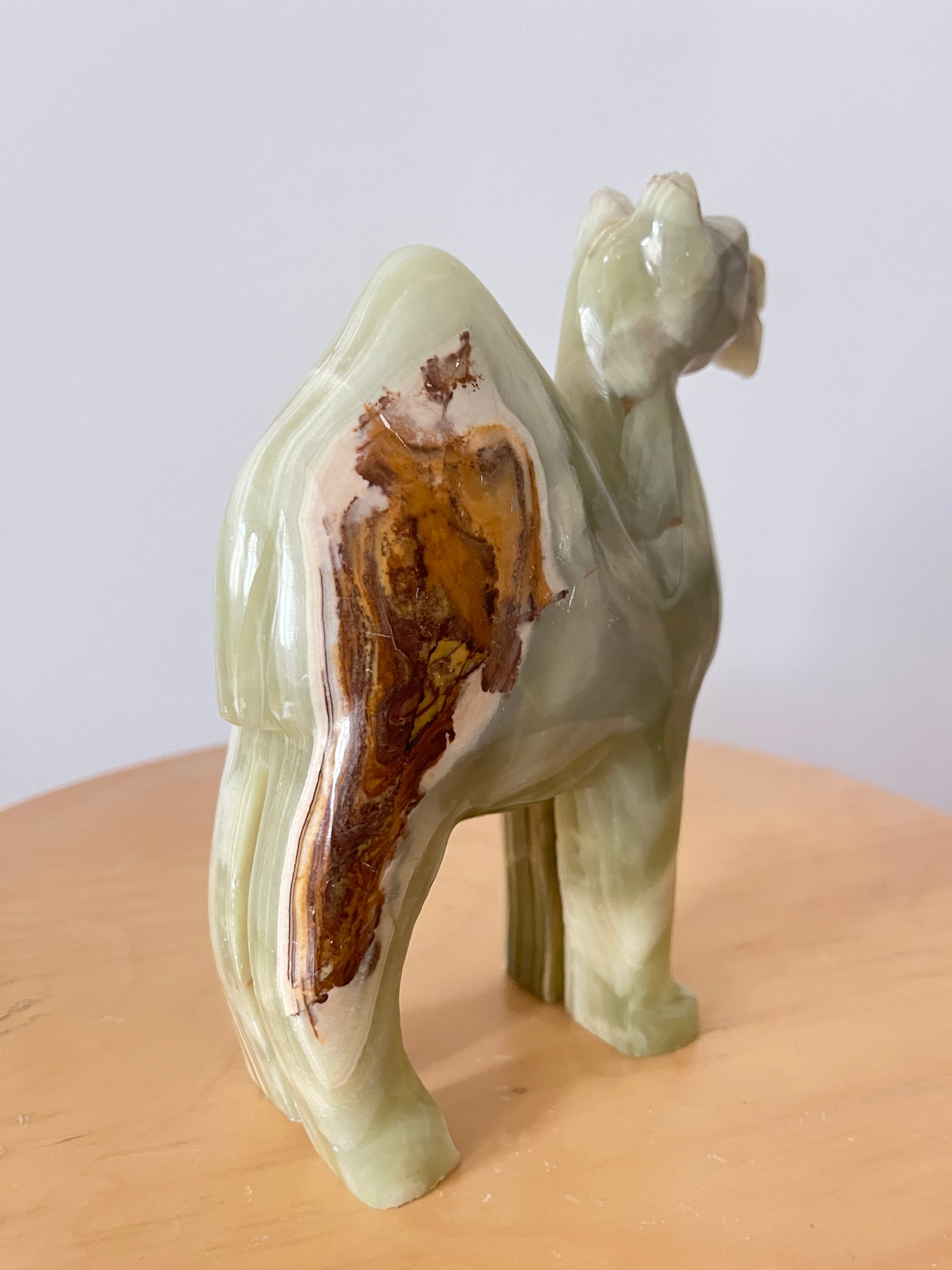 Vintage hand-carved green onyx dromedary camel figurine, 1970s, green and amber onyx camel