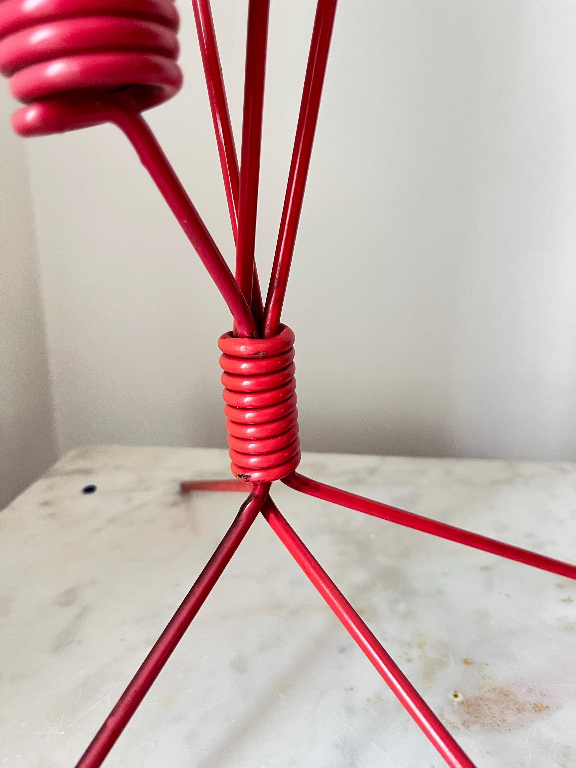 Vintage DDR red metal four-arm candlestick, East Germany, four sculptural arms with spiral holders